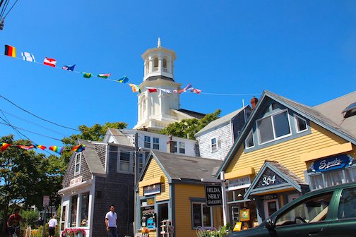 Commercial Street with shops and Provincetown Library